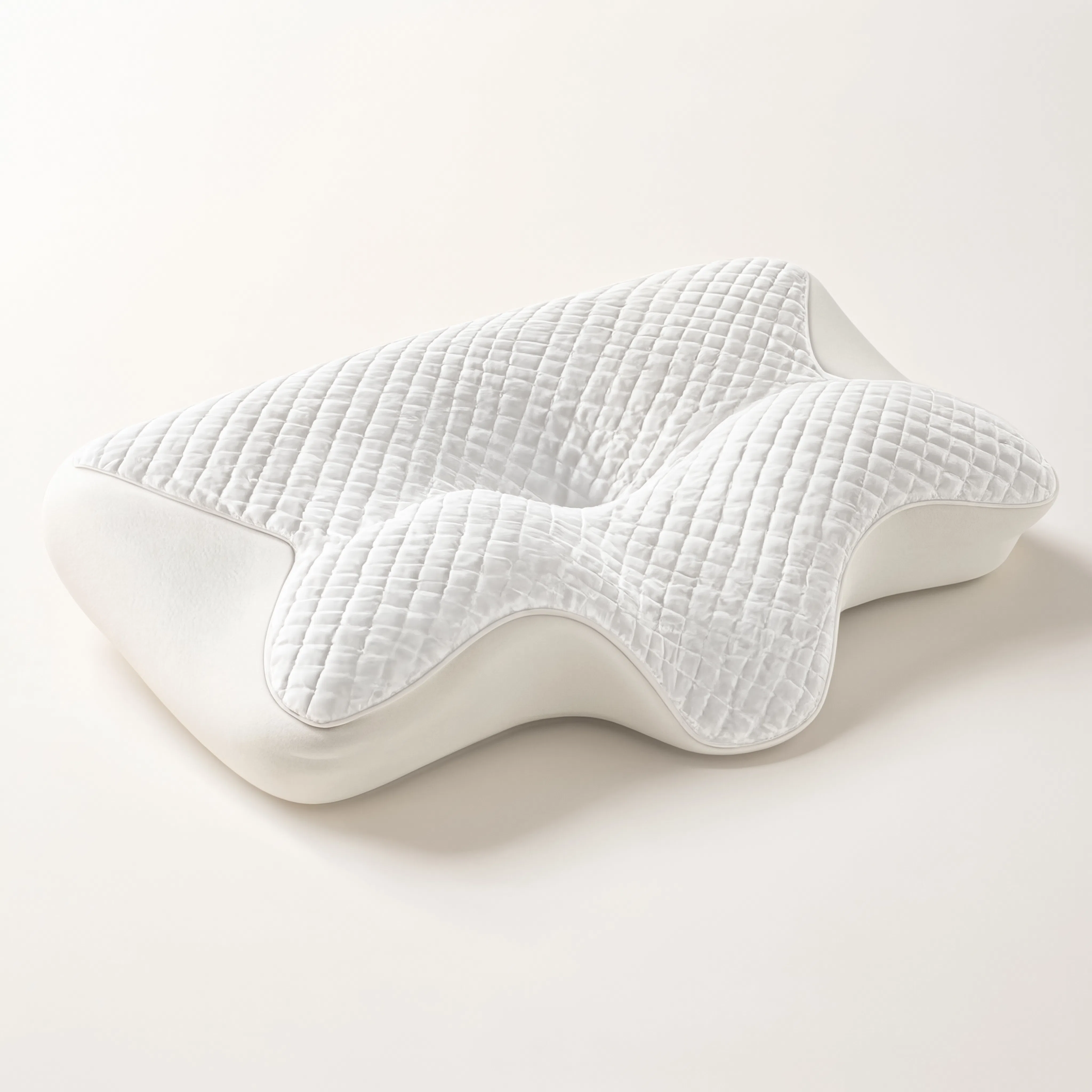 Oreiller cervical Cervéa CoolLounge — vue studio fond crème, forme ergonomique papillon